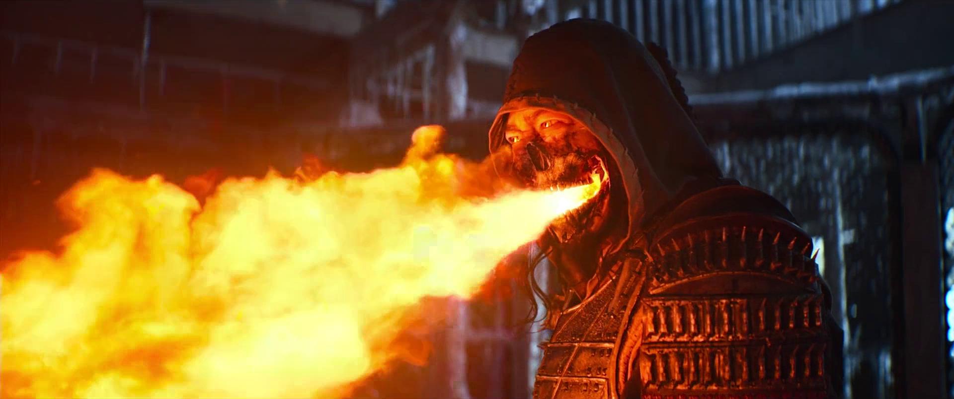 Scorpion unleashing a fiery breath attack against Sub-Zero in an intense, visually striking battle