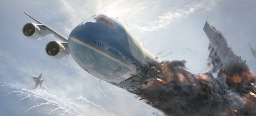 Air Force One explodes mid-air in White House Down (2013), with debris flying as a fighter jet trails behind